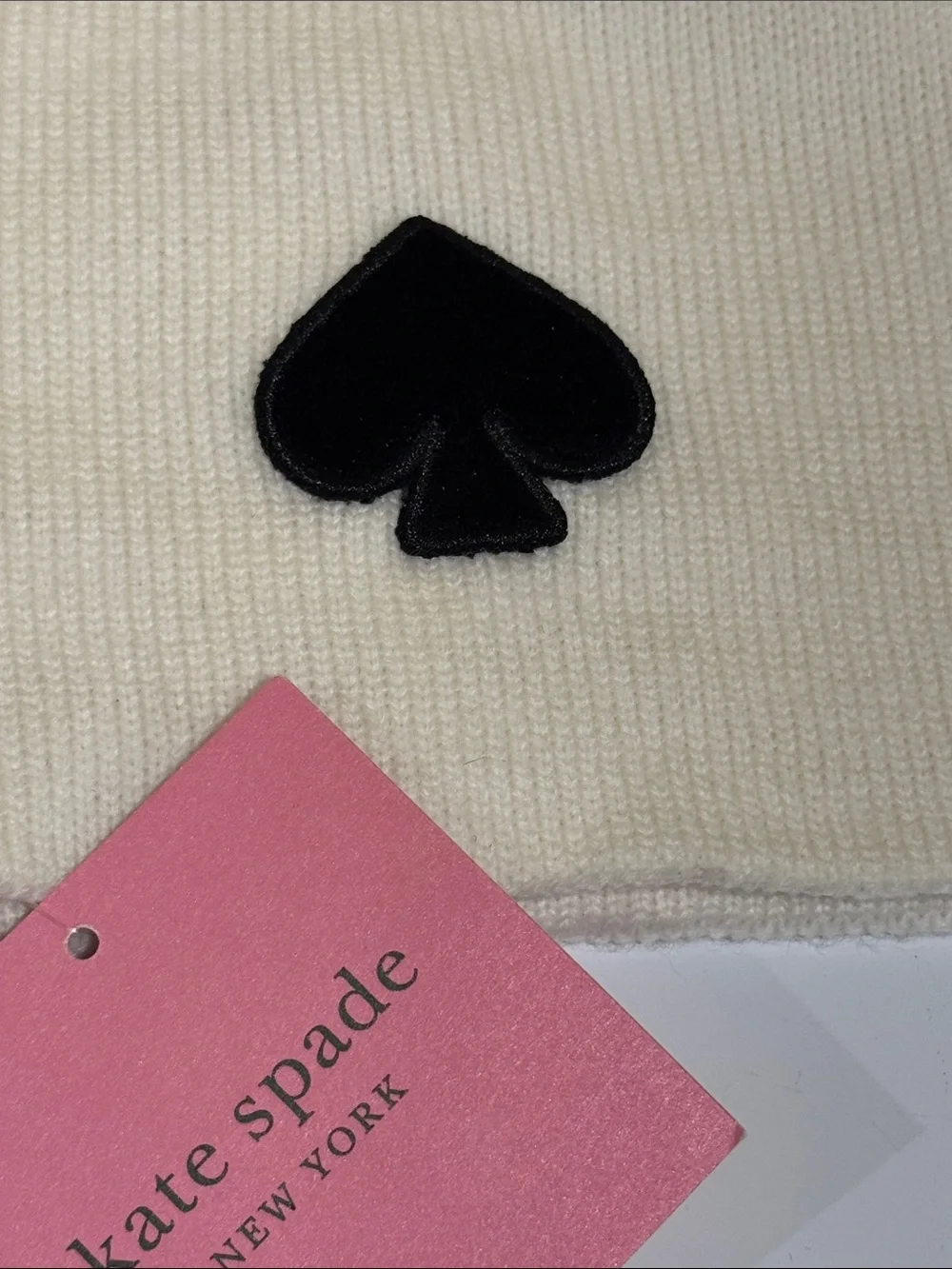 - NWT Kate Spade beanie hat. Color white  One size.